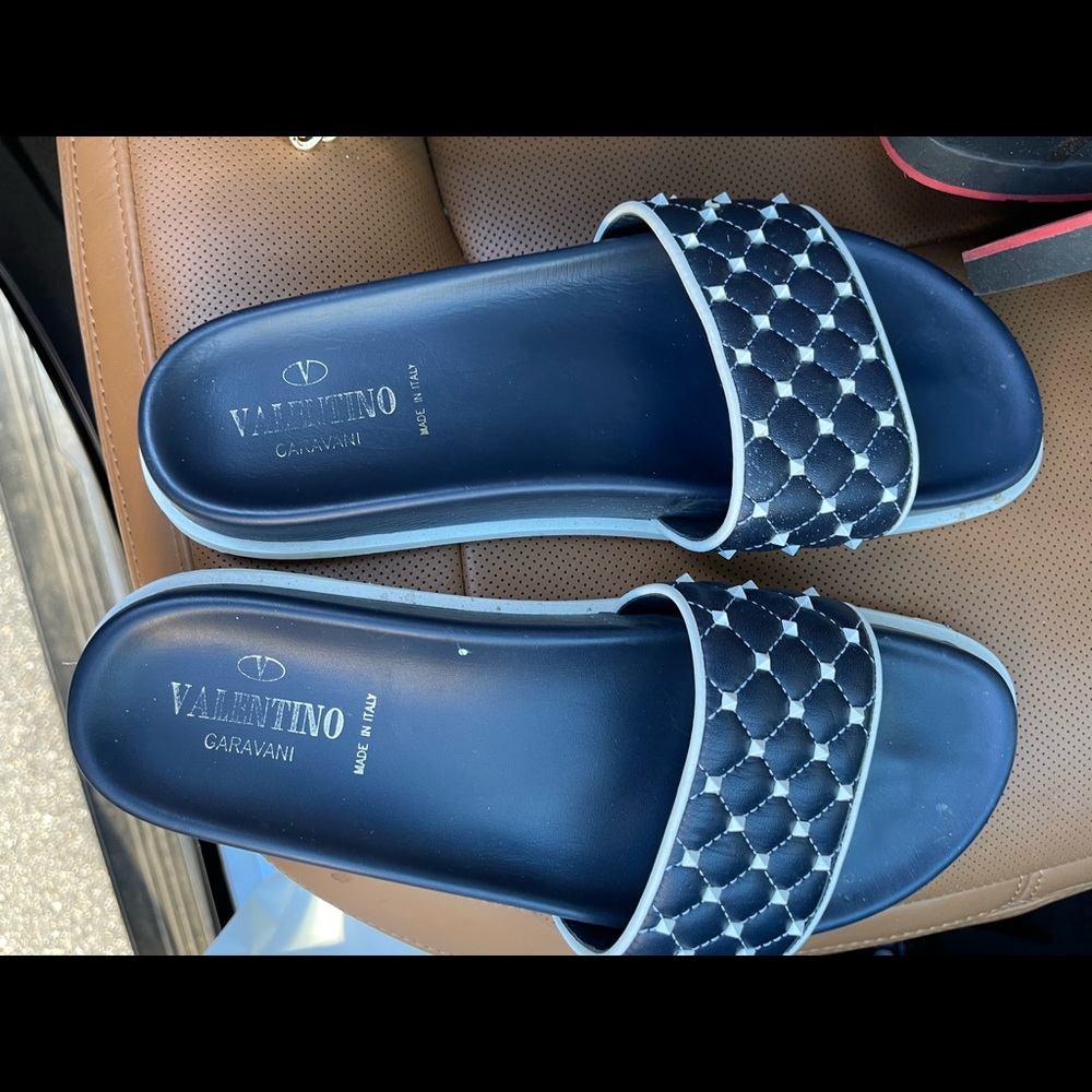 Valentino slides.